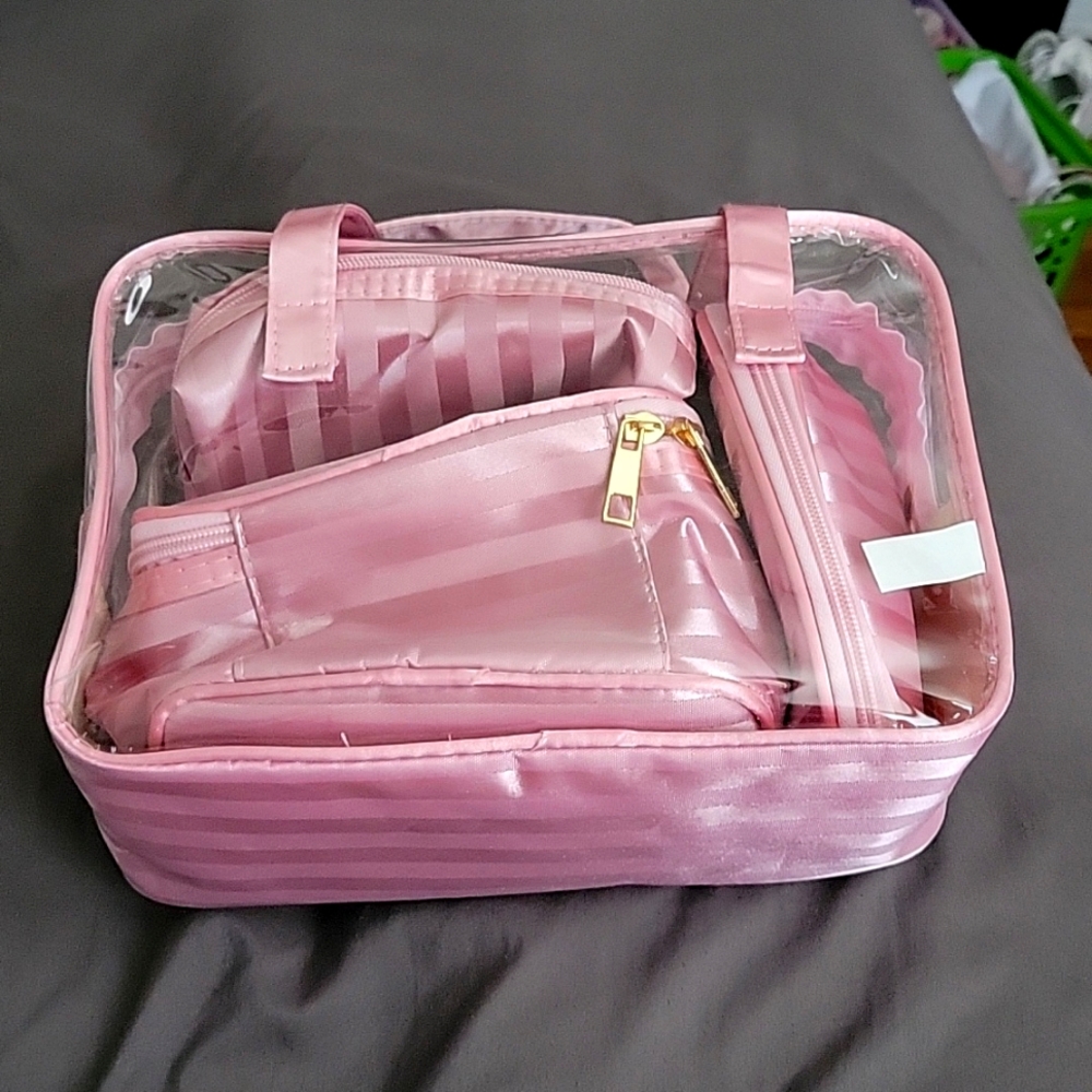 Set of satin pink makeup pouches